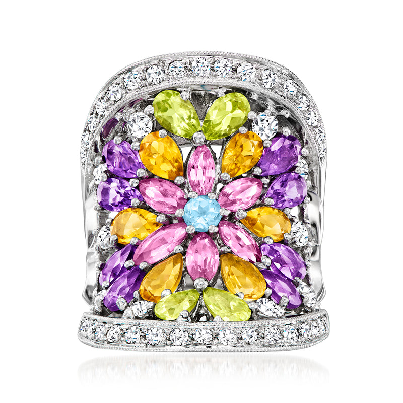 White gold floral cocktail ring with colorful gemstones and diamond halo, front view