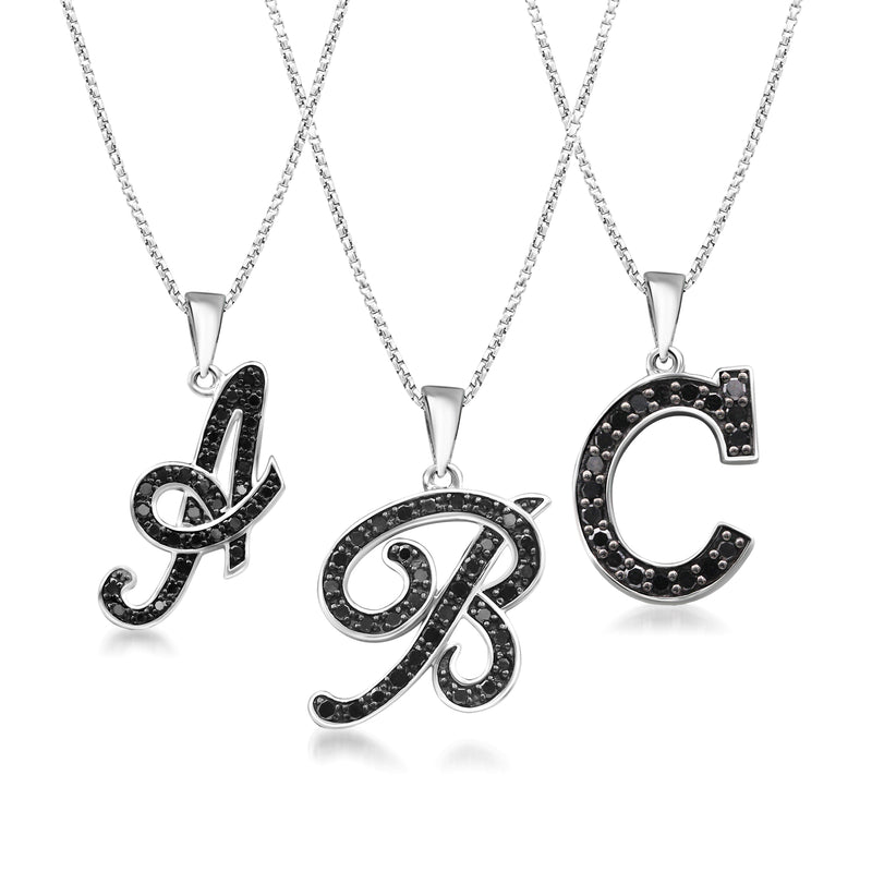 Set of three sterling silver initial pendant necklaces with black diamond pave letters