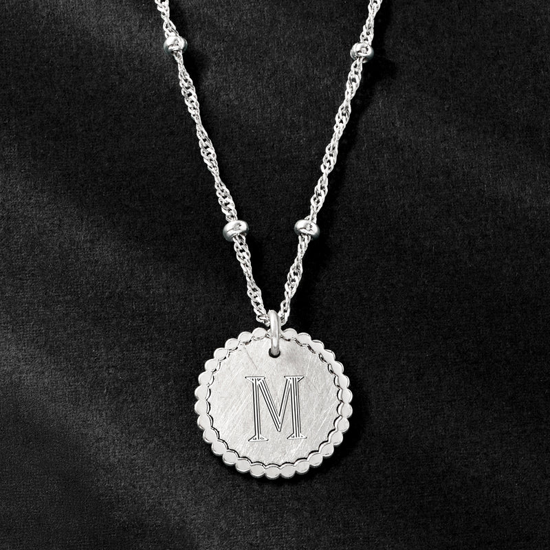 Sterling silver disc necklace with engraved 
