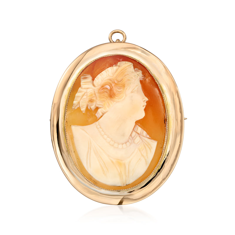 Oval shell cameo pendant in 10kt yellow gold with brown profile portrait