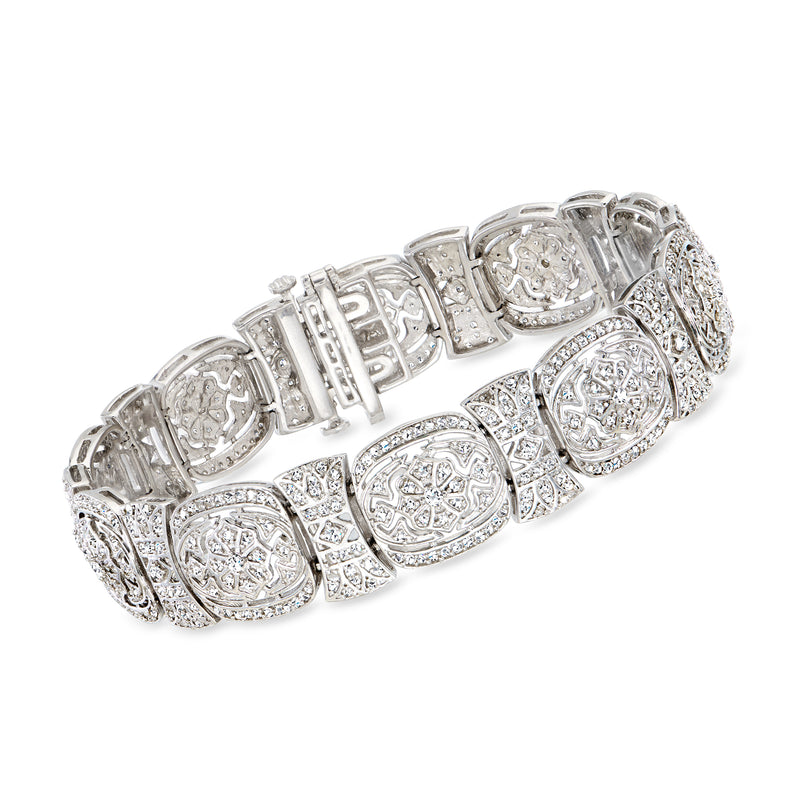 Sterling silver vintage-style diamond bracelet with oval and round gemstone settings