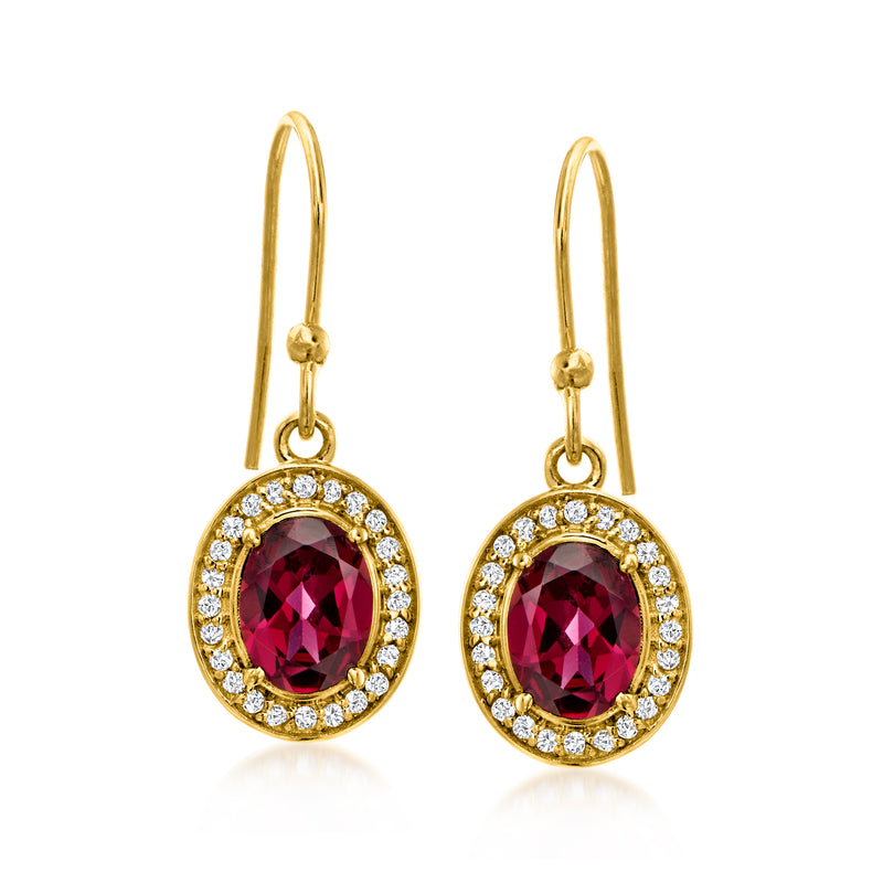Gold-tone drop earrings with oval red gemstone halo and round white stones