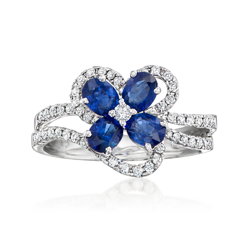 18k white gold sapphire and diamond flower ring with four blue center stones