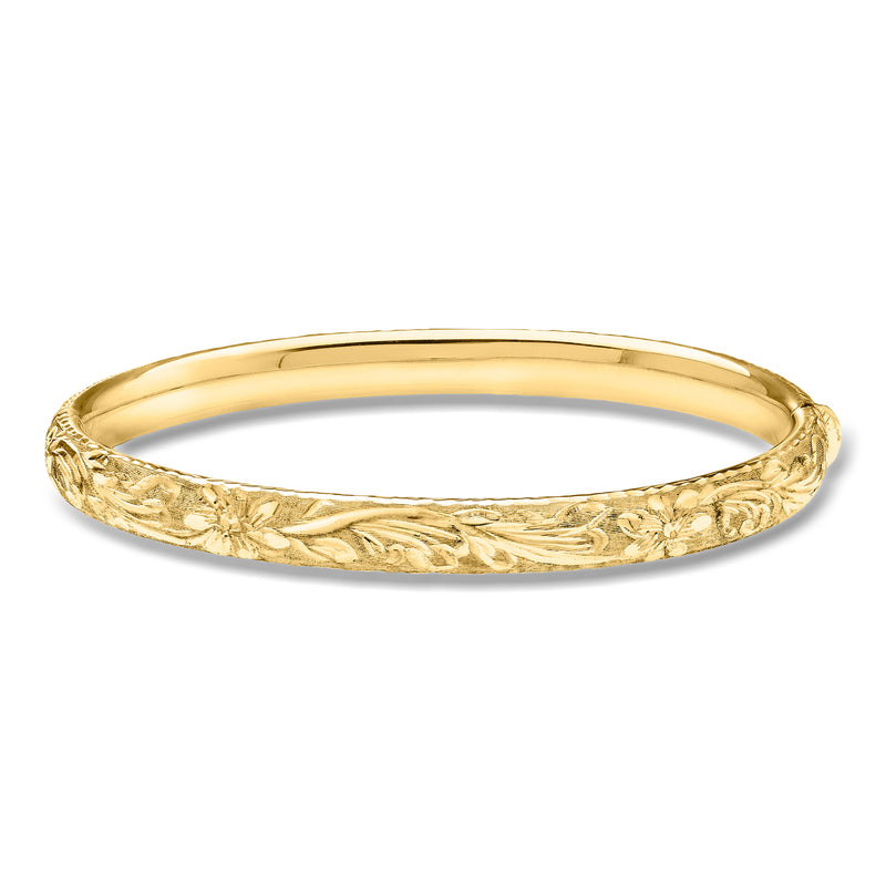 14kt yellow gold bangle bracelet with engraved floral Florentine-style pattern