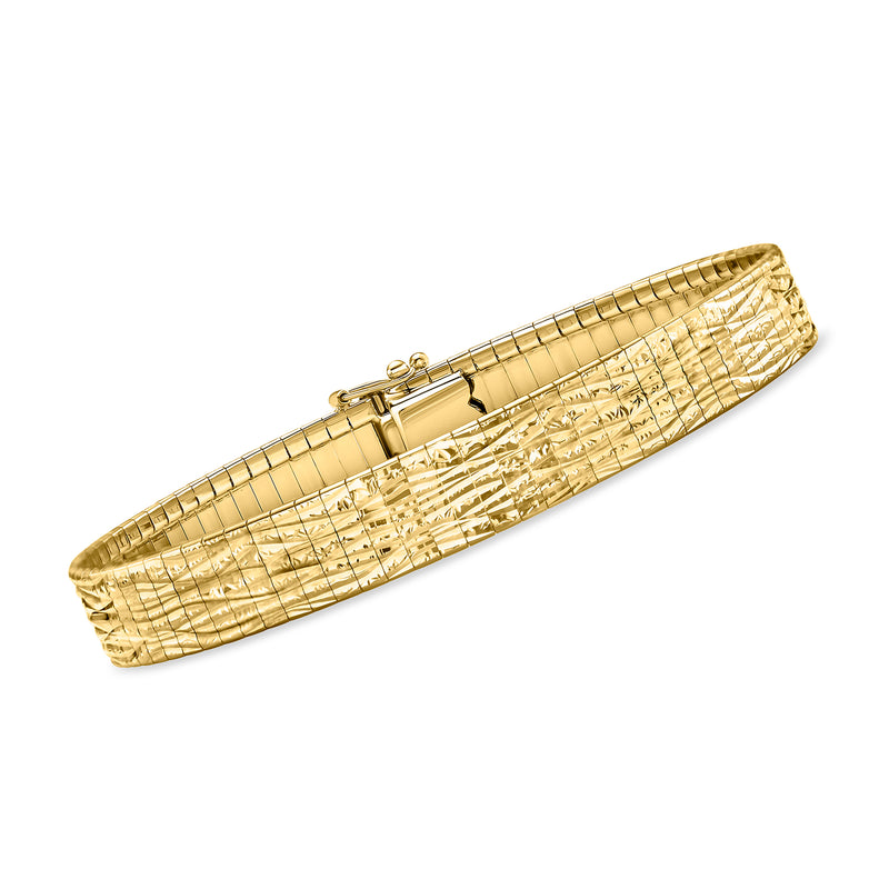 14kt yellow gold omega bracelet with textured link pattern and clasp closure
