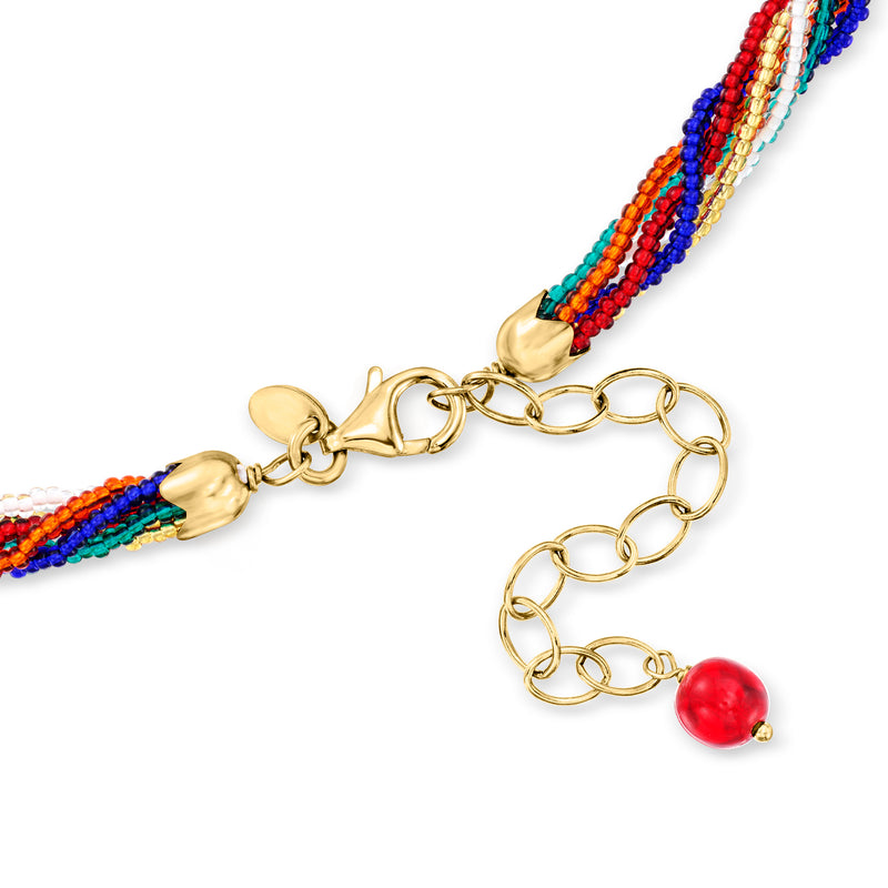 Multicolor bead necklace with gold-toned chain and lobster clasp, plus red charm