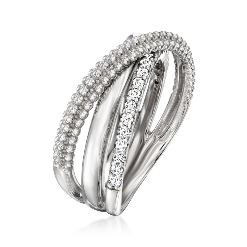 Sterling silver crisscross ring with three curved bands and bright round stones