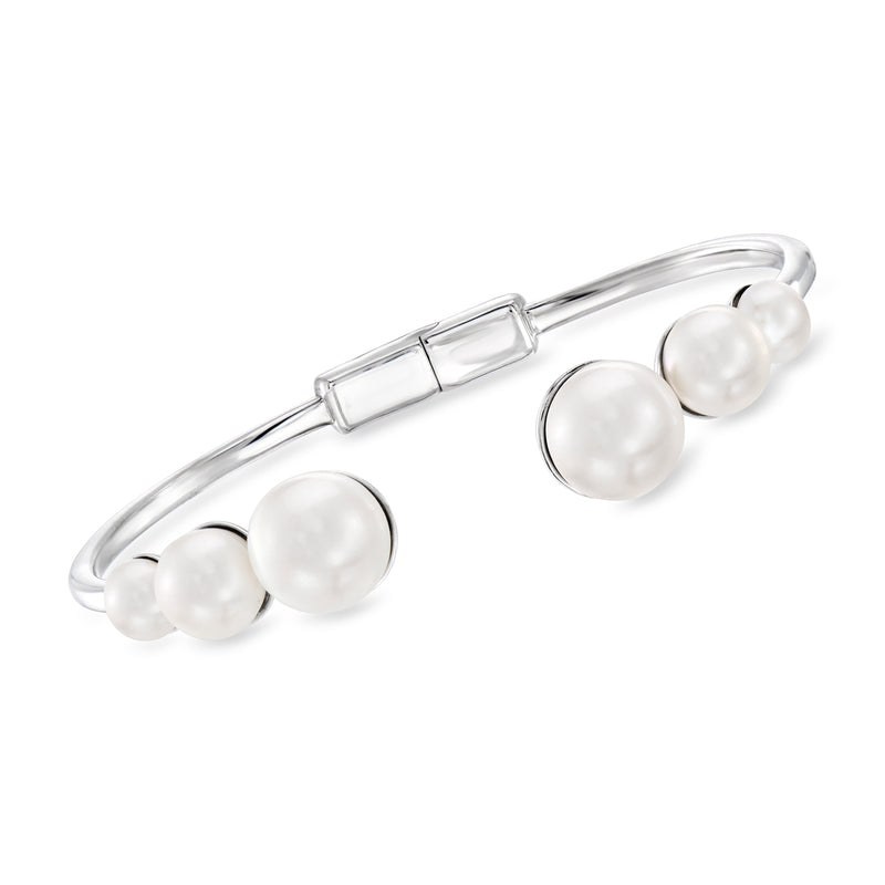 Sterling silver cuff bracelet with three cultured pearls and hinged clasp detail