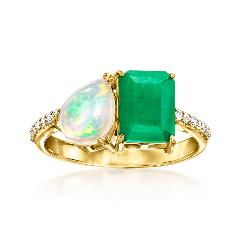 Gold toi et moi ring with green emerald-cut center stone and opal-like side stone