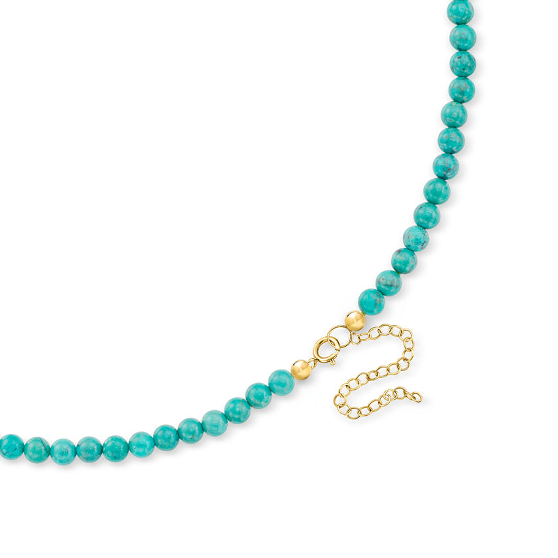 Turquoise bead necklace end with 14kt yellow gold clasp and short chain extender