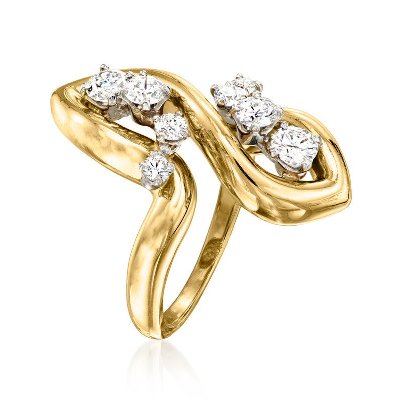 Yellow gold swirl ring with round diamonds in clustered oval-like sections
