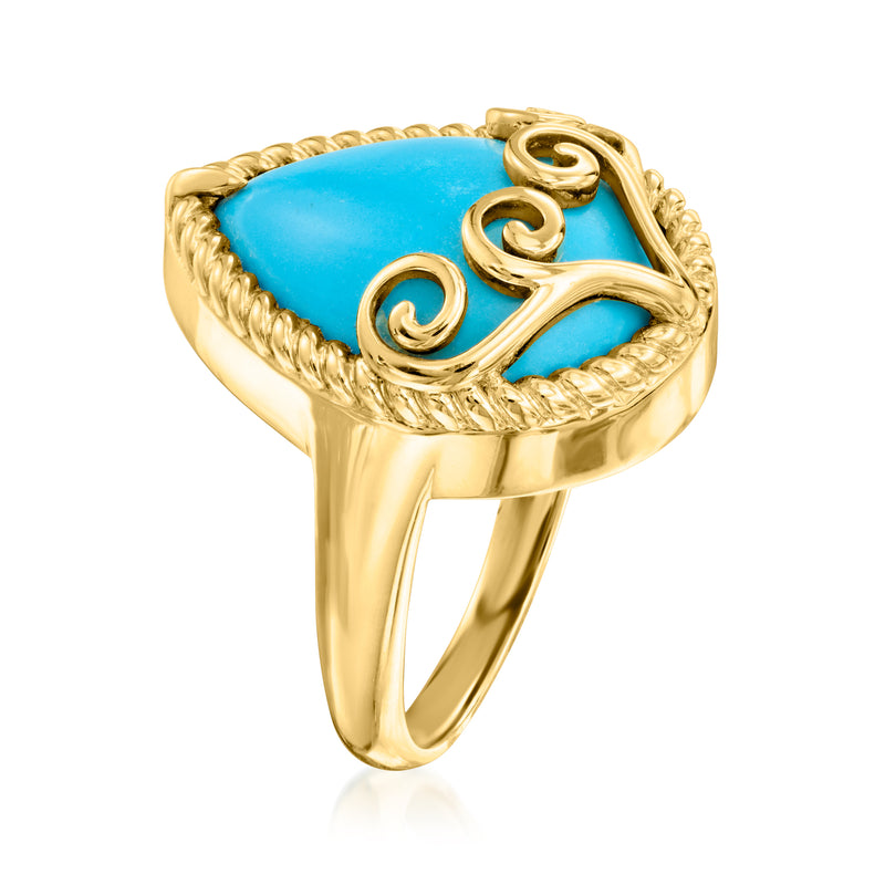 Gold scrollwork ring with raised turquoise teardrop gemstone