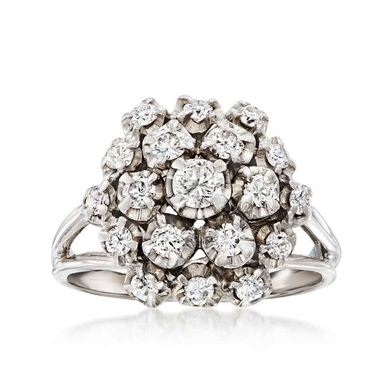 Vintage diamond cluster ring in 14kt white gold with round diamonds
