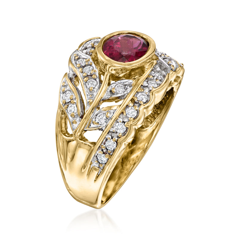 14kt yellow gold ring with oval pink tourmaline center and diamond side clusters