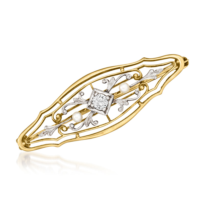 Vintage two-tone gold scroll pin with diamond center and seed pearls