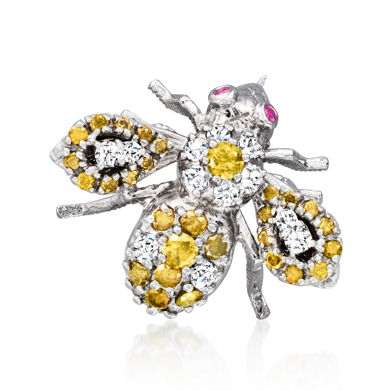 Vintage diamond bumblebee pin with yellow accents and pink ruby eyes in white metal