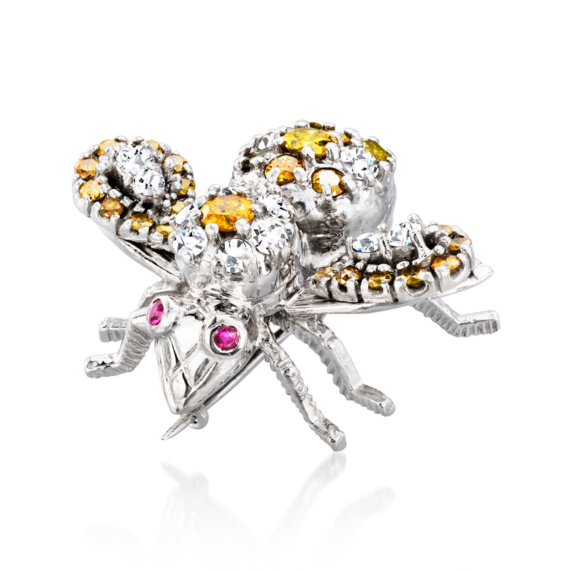 Vintage diamond bumblebee pin with yellow stones and pink ruby eyes, white metal