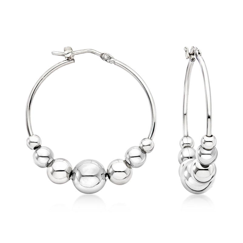 Sterling silver hoop earrings with graduated bead balls around the ring