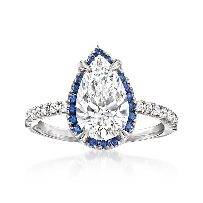 Oval lab-grown diamond ring in 14kt white gold with blue sapphire halo