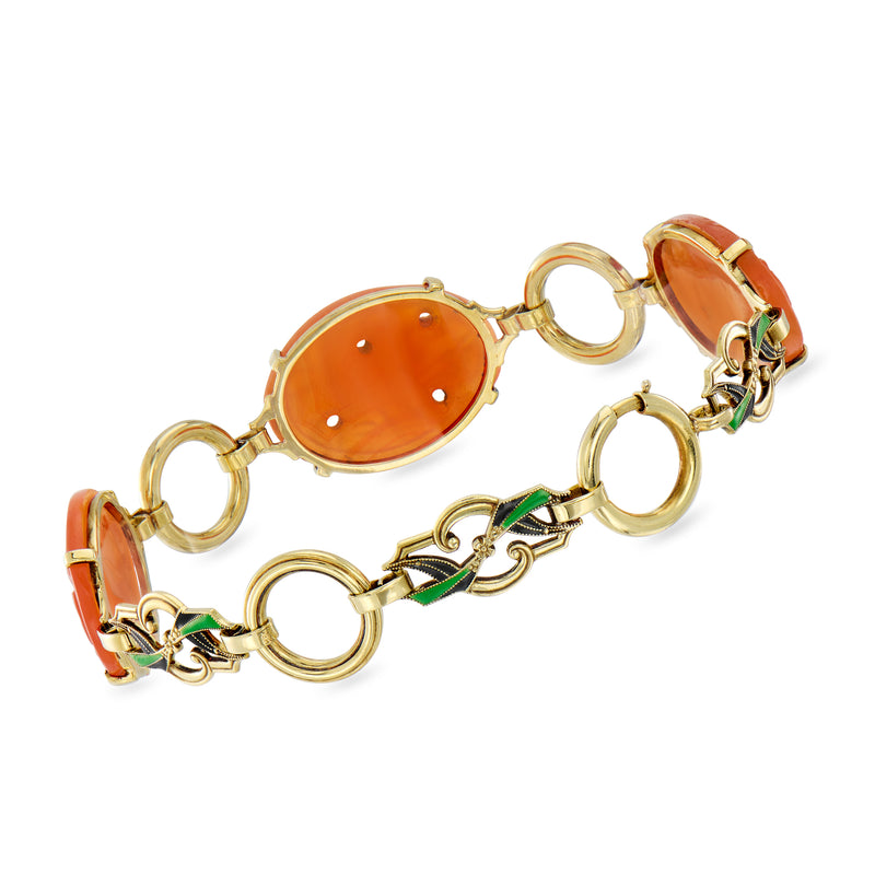 Vintage yellow gold link bracelet with oval orange stones and green enamel accents