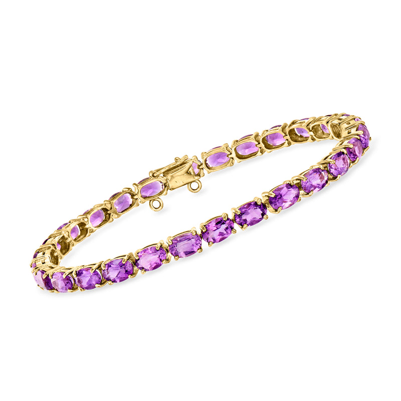 14kt yellow gold amethyst tennis bracelet with oval purple gemstones