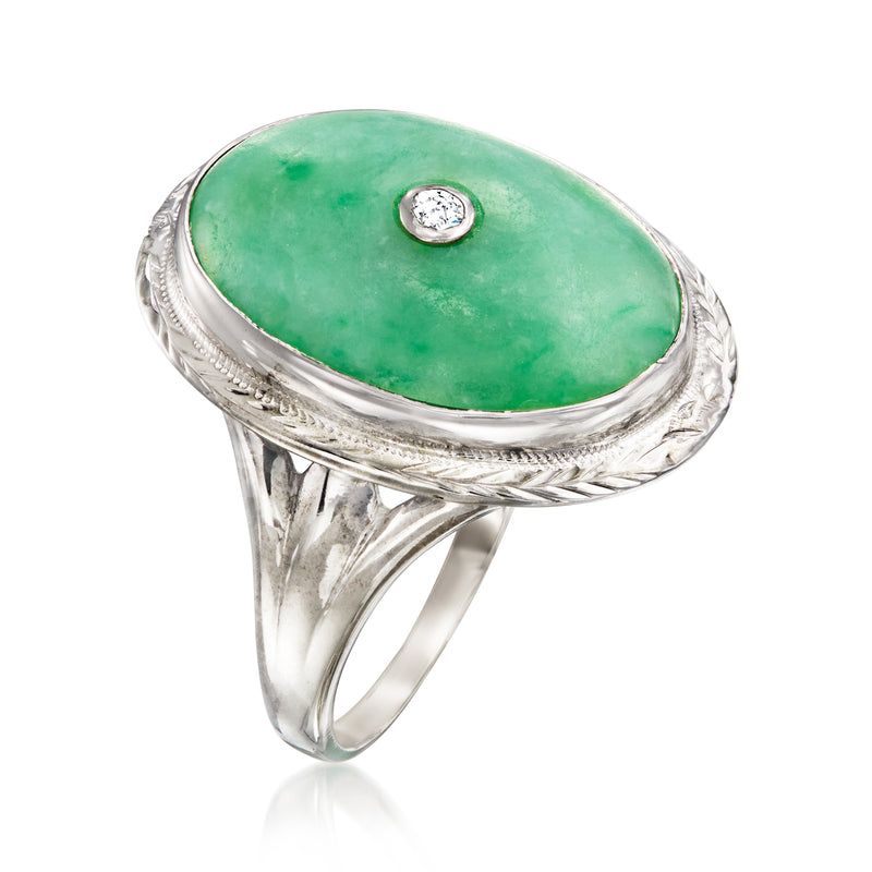 Side view oval green jade cabochon ring with single diamond in ornate 18kt white gold