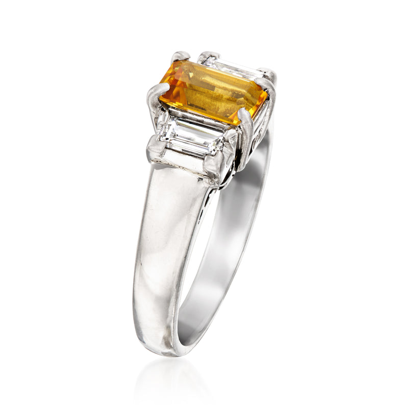 Platinum citrine and diamond ring with rectangular orange-yellow center stone
