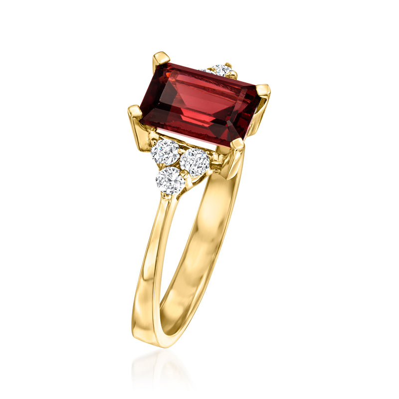 14kt yellow gold ring with red emerald-cut center garnet and diamond accents