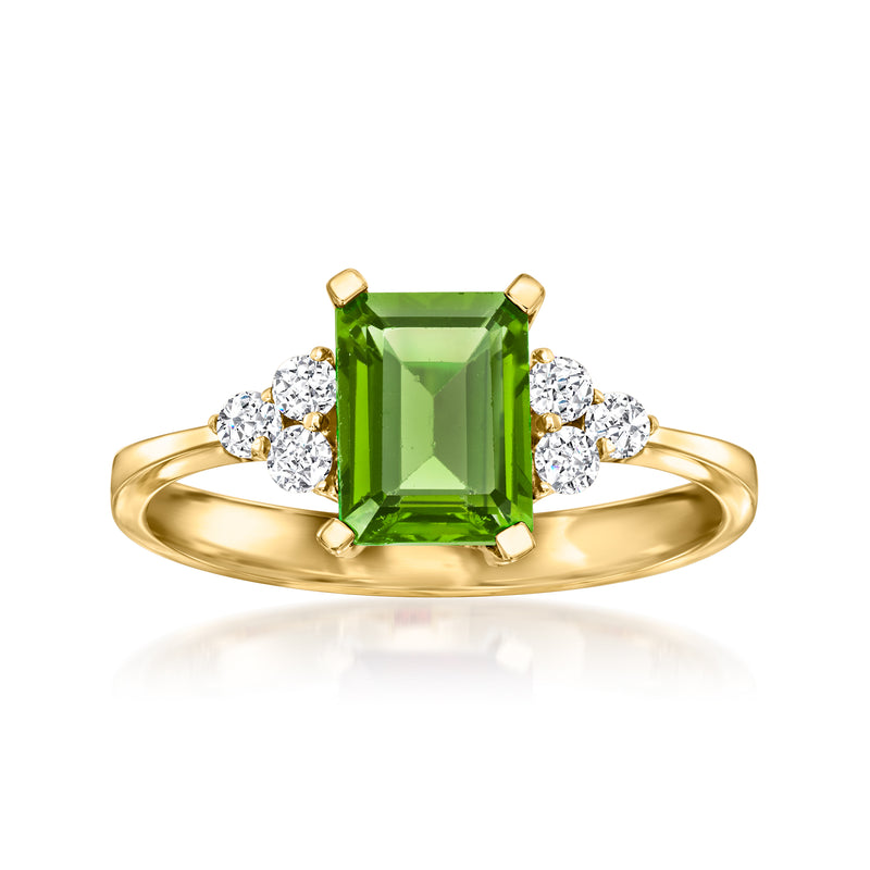 14kt yellow gold ring with emerald-cut peridot center and diamond side stones