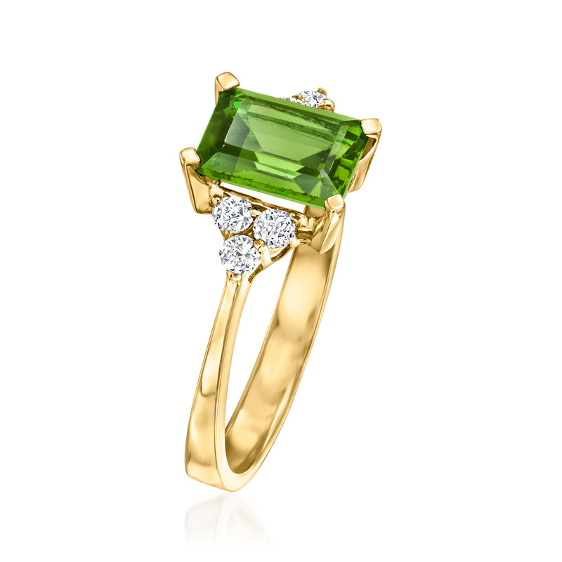 14kt yellow gold ring with large green peridot cushion and diamond accents, angled