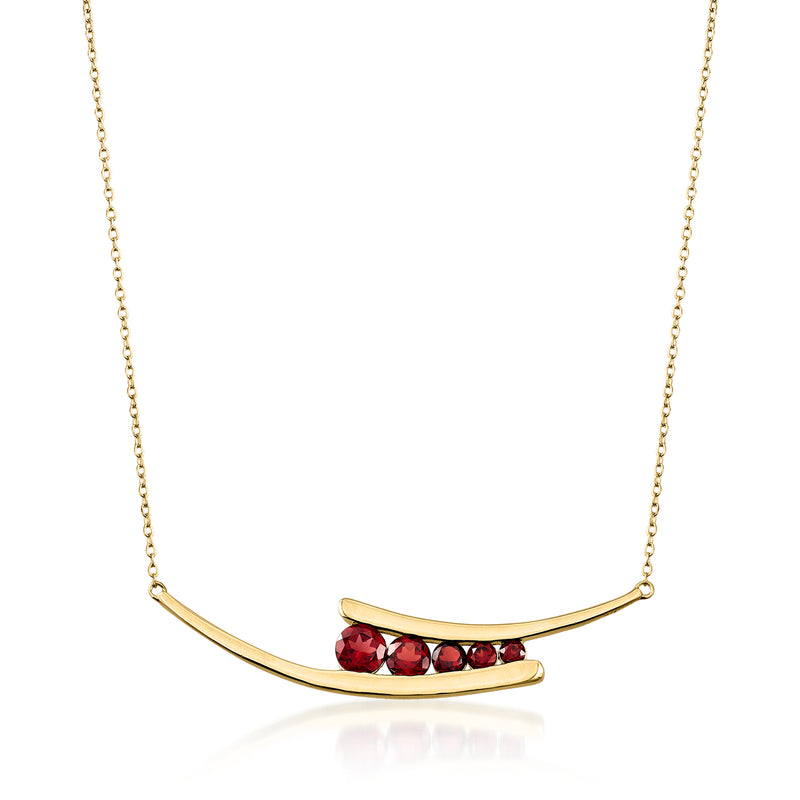 Gold over sterling curved-bar necklace with graduated red garnet stones