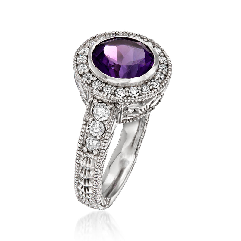 Amethyst and diamond ring in white gold with oval purple center stone and halo setting