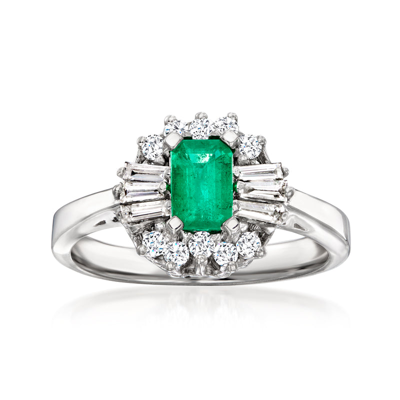 Emerald-cut green gemstone ring with round diamond halo, 14k white gold band