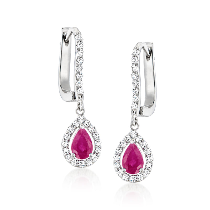 White gold teardrop earrings with ruby center and diamond halo, leverback closures.
