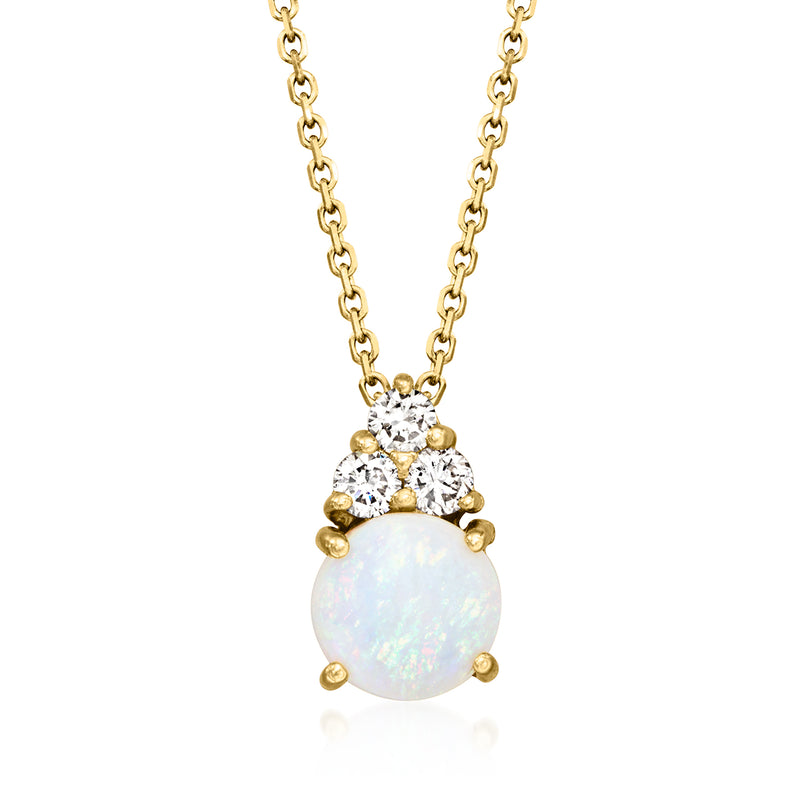 14kt yellow gold necklace with oval opal pendant and clustered round diamonds