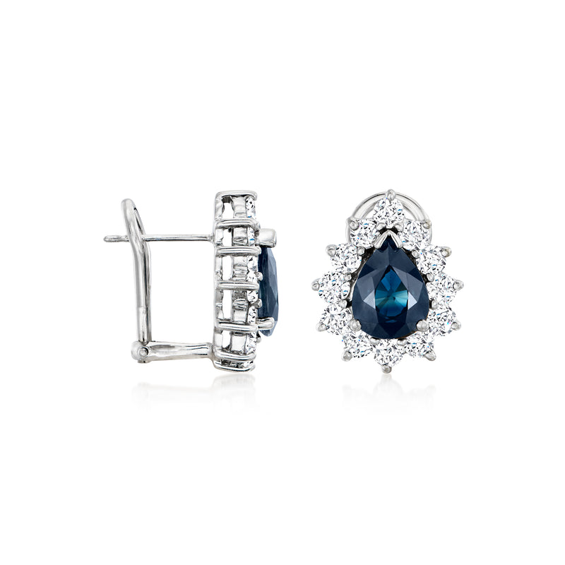White gold sapphire and diamond stud earrings with blue teardrop center and post backs