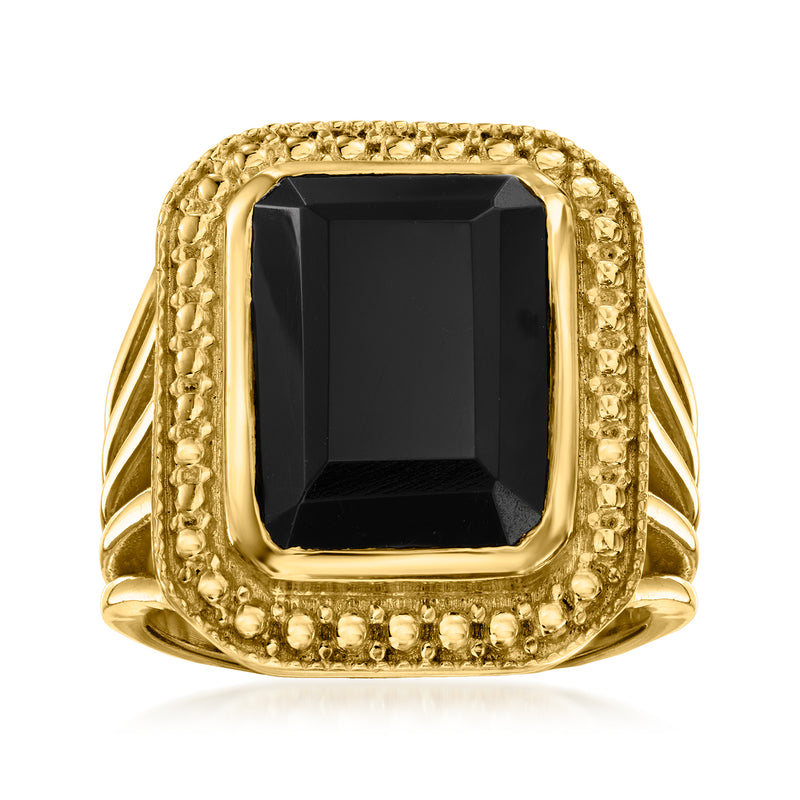 Gold over sterling onyx ring with square black gemstone, textured bezel and shoulders.