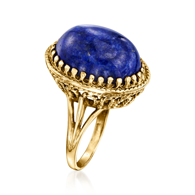 Oval blue lapis cabochon ring with scalloped gold bezel and three-prong band
