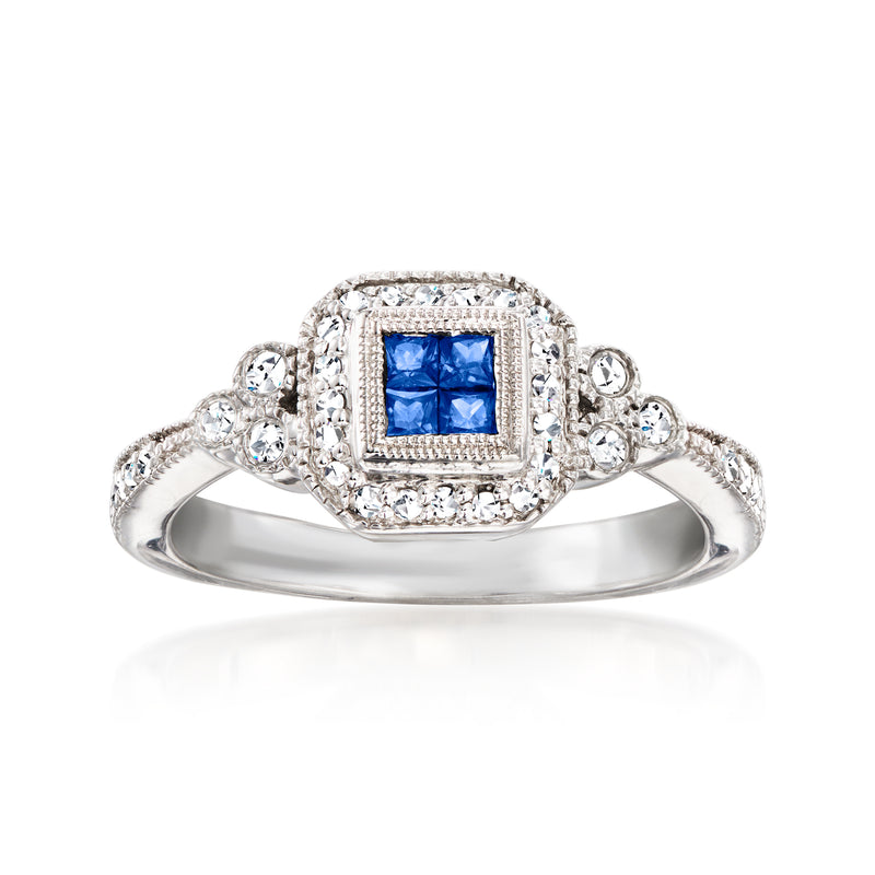 14kt white gold ring with square blue sapphire center and diamond halo and side accents