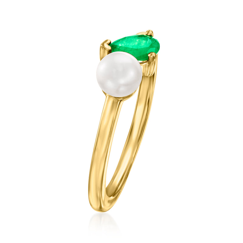 14kt yellow gold ring featuring white cultured pearl and green emerald teardrop on top