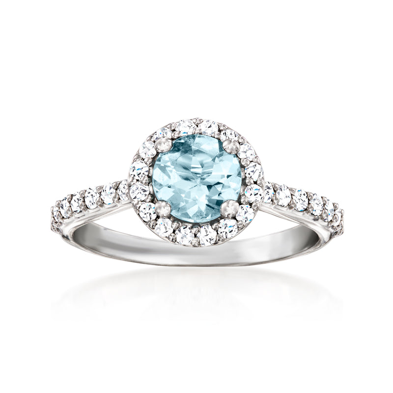 18kt white gold halo aquamarine diamond ring with oval center stone