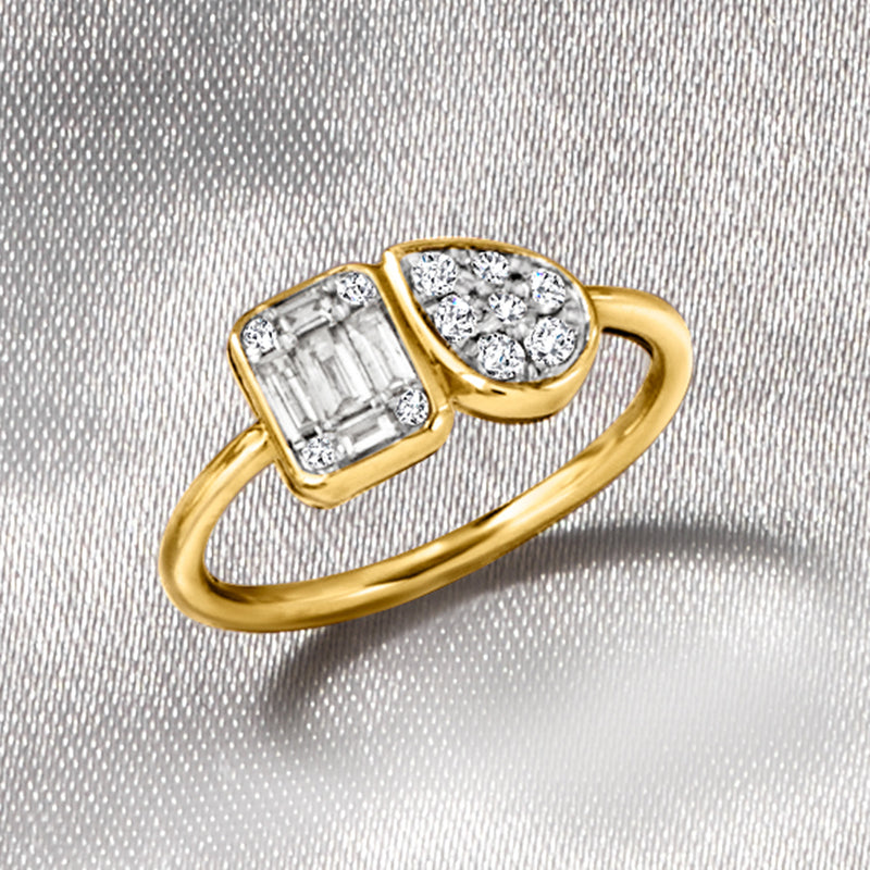 Toi et moi diamond ring in yellow gold with emerald-cut and pear-cut stones
