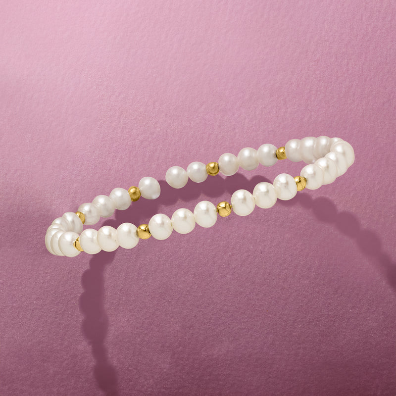 Cultured pearl bead stretch bracelet with gold spacer beads, curved view