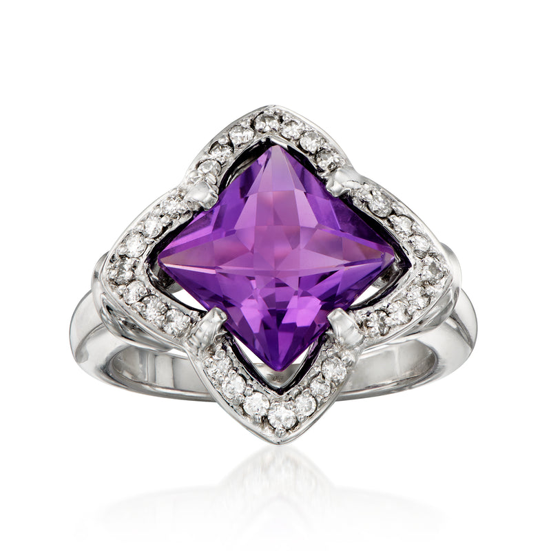 Amethyst cocktail ring in white gold with cushion gem and diamond halo