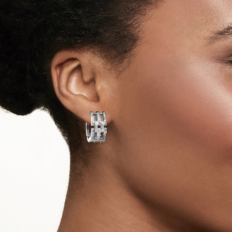 Diamond multi-row hoop earrings in white gold on ear