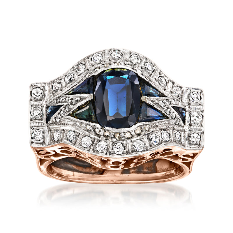 Vintage sapphire and diamond ring with blue center, diamond halo, platinum prongs, rose gold band
