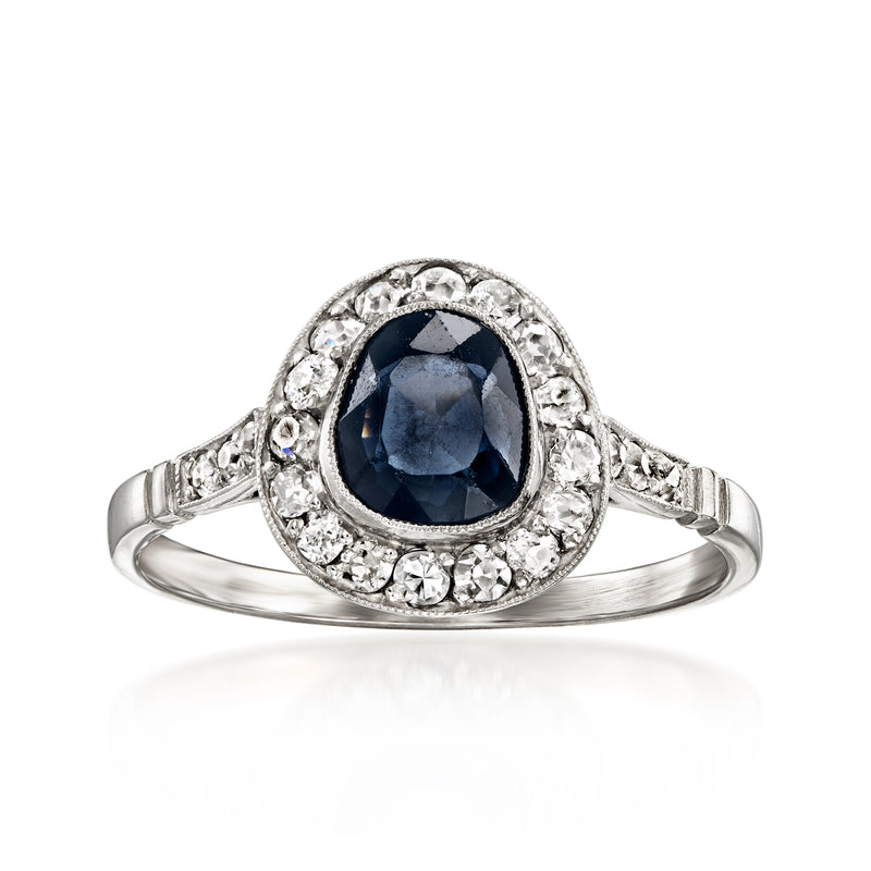 Oval sapphire centerpiece halo diamond ring in 14kt white gold, size 7