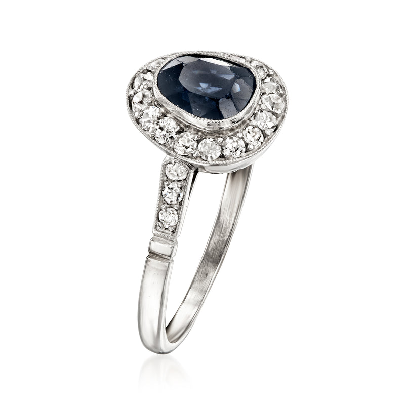 Sapphire oval ring with diamond halo, prong-set in 14kt white gold, slim band