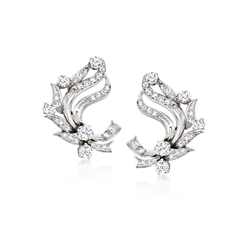 Swirl diamond stud earrings in platinum and 14kt white gold, clustered baguette stones
