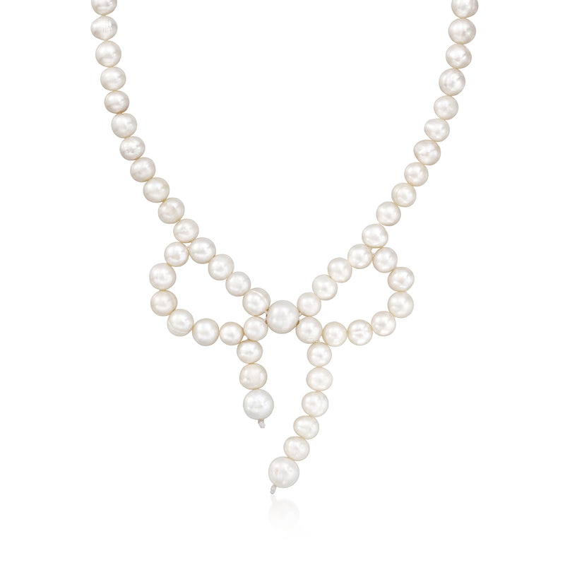 Cultured pearl bow necklace with layered pearl strands and dangling bow ends